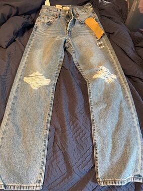 Levis 501 Original High Rise Straight Leg Distressed Jeans Light Wash 25x30. A